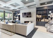 Thumbnail 10 of 36 - Luxury resident lounge space with free wi-fi at Tuscany Apartments in Houston.