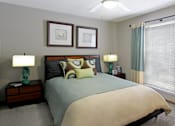 Thumbnail 19 of 30 - Spacious bedroom with walk-in closet and gray wall color at The Vanderbilt Apartments in Omaha, Nebraska