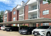 Thumbnail 25 of 36 - Luxury apartments with brick exteriors, covered parking, private storage, extra storage, at Tuscany Apartments in Houston.