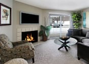 Thumbnail 20 of 30 - Spacious floor plan, open floor plan, spacious apartment with woodburning fireplace, spacious dining room, and gray wall color at The Vanderbilt Apartments in central Omaha, Nebraska