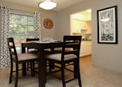 Thumbnail 6 of 19 - Spacious dining room and bright white kitchens at Plantation apartments in Houston.