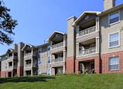 Thumbnail 14 of 35 - Luxury apartments in southwest Omaha with scenic views of trees and landscaping from patios and balconies