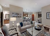 Thumbnail 9 of 42 - Luxury apartments with spacious living room and dining room with built-in buffet with granite slab top, and 10-foot ceilings at Tuscany Walk Apartments in Houston Texas.