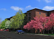Thumbnail 28 of 41 - Apartments in central Omaha with brick exteriors, huge balconies, spacious balconies, scenic views, lots of trees, and beautiful landscaping at Embassy Park Apartments in Omaha, Nebraska