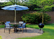 Thumbnail 34 of 36 - Luxury apartments with lush landscaping, picnic area, grilling station, park-like setting, and scenic views at Lenox Village Apartments in Lincoln, Nebraska