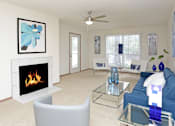 Thumbnail 6 of 44 - Apartments in central Lincoln Nebraska with spacious living room, spacious floor plan, huge living room, and woodburning fireplace at Tanglewood Apartments