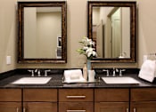 Thumbnail 39 of 42 - Spacious luxury bath suite with cultured marble vanity with double sinks and double mirrors Tuscany Walk Apartments in Houston