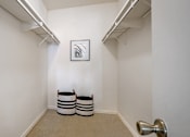 Thumbnail 13 of 38 - a hallway with two vases in the corner of a room