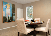 Thumbnail 37 of 42 - Spacious floor plan, spacious dining room with oversized windows and lots of natural light at Woodlake on the Bayou Apartments in Houston.