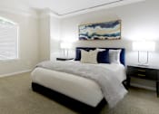 Thumbnail 18 of 26 - Huge bedroom, spacious bedroom with vaulted ceiling, ceiling fan, walk-in closet, and attached bathroom at Tuscany Villas Townhomes in Houston.