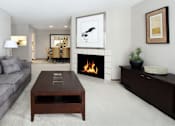 Thumbnail 25 of 30 - Spacious floor plan, gray wall color, spacious apartment with woodburning fireplace, spacious kitchen, spacious dining room, and bright white kitchen at The Vanderbilt Apartments in central Omaha, Nebraska