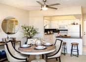 Thumbnail 7 of 41 - Apartments with open floor plan, spacious layout, colored feature wall, kitchen island, and prep island at Embassy Park Apartments in Omaha, Nebraska