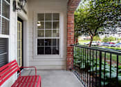Thumbnail 29 of 36 - Luxury apartments with red brick exterior, spacious balconies, lush landscaping, and scenic views at Lenox Village Apartments in Lincoln, Nebraska