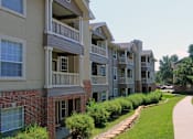 Thumbnail 22 of 35 - Luxury apartments in southwest Omaha with scenic views of trees and landscaping from patios and balconies