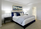 Thumbnail 10 of 26 - Huge bedroom, spacious bedroom with vaulted ceiling, ceiling fan, walk-in closet, and attached bathroom at Tuscany Villas Townhomes in Houston.