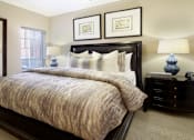 Thumbnail 17 of 22 - Luxury apartments with spacious bedrooms that can fit a king-size bed with attached bathrooms and walk-in closets at The Dorchester Apartments in north Dallas.