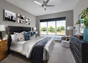 Thumbnail 5 of 62 - Luxury apartments with master bedroom to fit a king size bed, attached master bathroom and walk-in closet at Xenia Apartments in Golden Valley, Minnesota