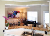 Thumbnail 23 of 26 - Spacious luxury apartments with 9-foot ceilings, granite breakfast bars, oversized windows and white kitchen cabinets at RidgeGate Apartments in Minnetonka, Minnesota