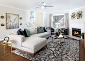 Thumbnail 1 of 34 - Spacious living room with wood-burning fireplace, huge living room at Tuscany Row Townhomes in Houston.