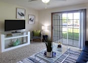 Thumbnail 23 of 44 - Apartments in central Lincoln Nebraska with spacious living room, spacious floor plan, spacious balcony at Tanglewood Apartments