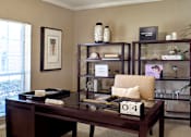 Thumbnail 19 of 22 - Gated apartment community near the Galleria with den or office space with wet bar at The Dorchester Apartments in Houston.