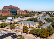Thumbnail 7 of 36 - Aerial view of Kensington Square Apartments near the Sallie Mae building in Dallas Texas