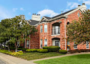 Thumbnail 8 of 36 - Luxury apartments located at 70th and Pioneers Blvd with red brick exterior and scenic views