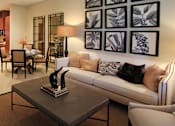 Thumbnail 22 of 36 - Luxury apartments next to the Galleria in Dallas with spacious floor plan, granite countertops, stainless steel appliances, built-in wine rack, kitchen island, and porcelain tile floor at Villa Piana Apartments in Dallas