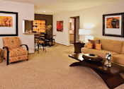 Thumbnail 23 of 35 - Spacious apartments with colored feature wall, granite breakfast bar, spacious dining room, and spacious living room at LionsHead Apartments in Omaha, Nebraska