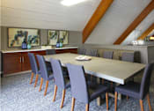 Thumbnail 20 of 27 - Luxury resident clubhouse with meeting room, conference room, free wi-fi, resident kitchen, resident lounge, and meeting room at Alpine Village Apartments in La Vista, Nebraska