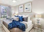 Thumbnail 7 of 73 - Luxury apartments with spacious bedrooms with attached bathrooms and walk-in closets at The Saxony Apartments in Dallas
