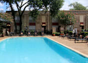 Thumbnail 18 of 21 - Townhome community with 4 swimming pools, beautiful landscaping, unique townhome community with a small community feel at Briarwood Apartments in Houston.
