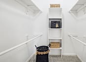 Thumbnail 63 of 73 - Spacious walk-in closet at The Saxony Apartments in Dallas Texas