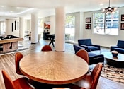 Thumbnail 18 of 29 - Spacious modern resident lounge with pool table, sitting areas, and wi-fi at Delante Apartments in Irvington, texas