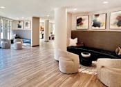 Thumbnail 16 of 29 - Modern resident lounge with sitting areas and wi-fi at Delante Apartments in Irvington, Texas