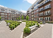 Thumbnail 3 of 62 - Huge luxury courtyard with lush landscaping at Xenia Apartments in Golden Valley Minnesota