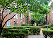 Thumbnail 11 of 22 - Gated apartment community near the Galleria with landscaped courtyards, beautiful landscaping, and beautiful courtyards with fountains.