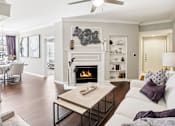 Thumbnail 2 of 73 - Luxury apartments with wood-burning fireplace, wood plank floors, built-in bookshelves, spacious dining room, and 9-foot ceilings at The Saxony Apartments
