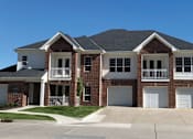 Thumbnail 43 of 46 - Luxury townhomes with attached garages, scenic views and red brick exteriors at Bellemeade Apartments in west Des Moines