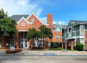 Thumbnail 13 of 36 - Luxury apartments with two resort-style swimming pools near the Mary Kay Museum with attached garages, golf course views, and beautiful landscaping in Dallas.