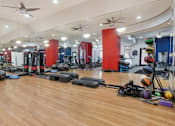 Thumbnail 46 of 73 - Huge spacious fitness center with variety of cardio and weight-lifting equipment at Saxony Apartments in Dallas