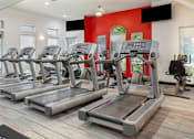 Thumbnail 67 of 73 - Huge spacious fitness center with variety of cardio and weight-lifting equipment at Saxony Apartments in Dallas