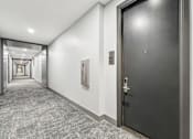 Thumbnail 42 of 62 - Front doors with digital locks, hallway area at Xenia Apartments in Golden Valley Minnesota