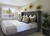 Thumbnail 14 of 20 - Spacious bedroom with walk-in closet and gray wall color at Inwood Apartments in La Vista, Nebraska