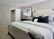 Thumbnail 18 of 20 - Spacious bedroom with walk-in closet and gray wall color at Inwood Apartments in La Vista, Nebraska