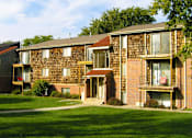 Thumbnail 5 of 20 - Apartments with scenic views, lush landscaping, park-like setting, and lots of trees at Inwood Apartments in La Vista, Nebraska