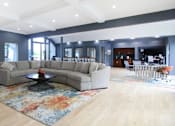 Thumbnail 4 of 27 - Recently remodeled large clubhouse with free wi-fi, resident lounge, and resident kitchen area at Kensington Woods Apartments in Omaha, Nebraska
