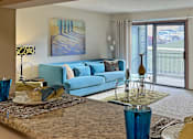 Thumbnail 13 of 35 - Spacious living room with granite breakfast bar at LionsHead Apartments in Omaha Nebraska