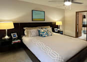 Thumbnail 5 of 35 - Spacious bedroom with walk-in closet and attached bathroom at LionsHead Apartments in Omaha Nebraska