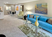 Thumbnail 2 of 35 - Spacious living and dining room area with granite breakfast bar, and painted feature wall at LionsHead Apartments in Omaha Nebraska